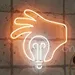 Custom Neon | Custom Neon Sign | Hand Holding Light Bulb Design | Orange and White Glow | Size 19x18 Inches 1