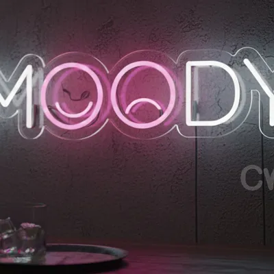 “MOODY – A Playful Logo Design Featuring Contrasting Emotions with Happy and Sad Faces in the Double O’s, Representing the Dual Nature of Human Moods in a Stylish, Modern, and Minimalistic Way”